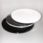 Acrylic circles in black, clear, and white colors
